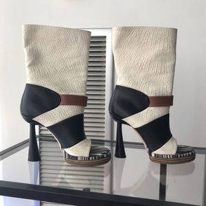 BALENCIAGA funnel heel open toe booties.